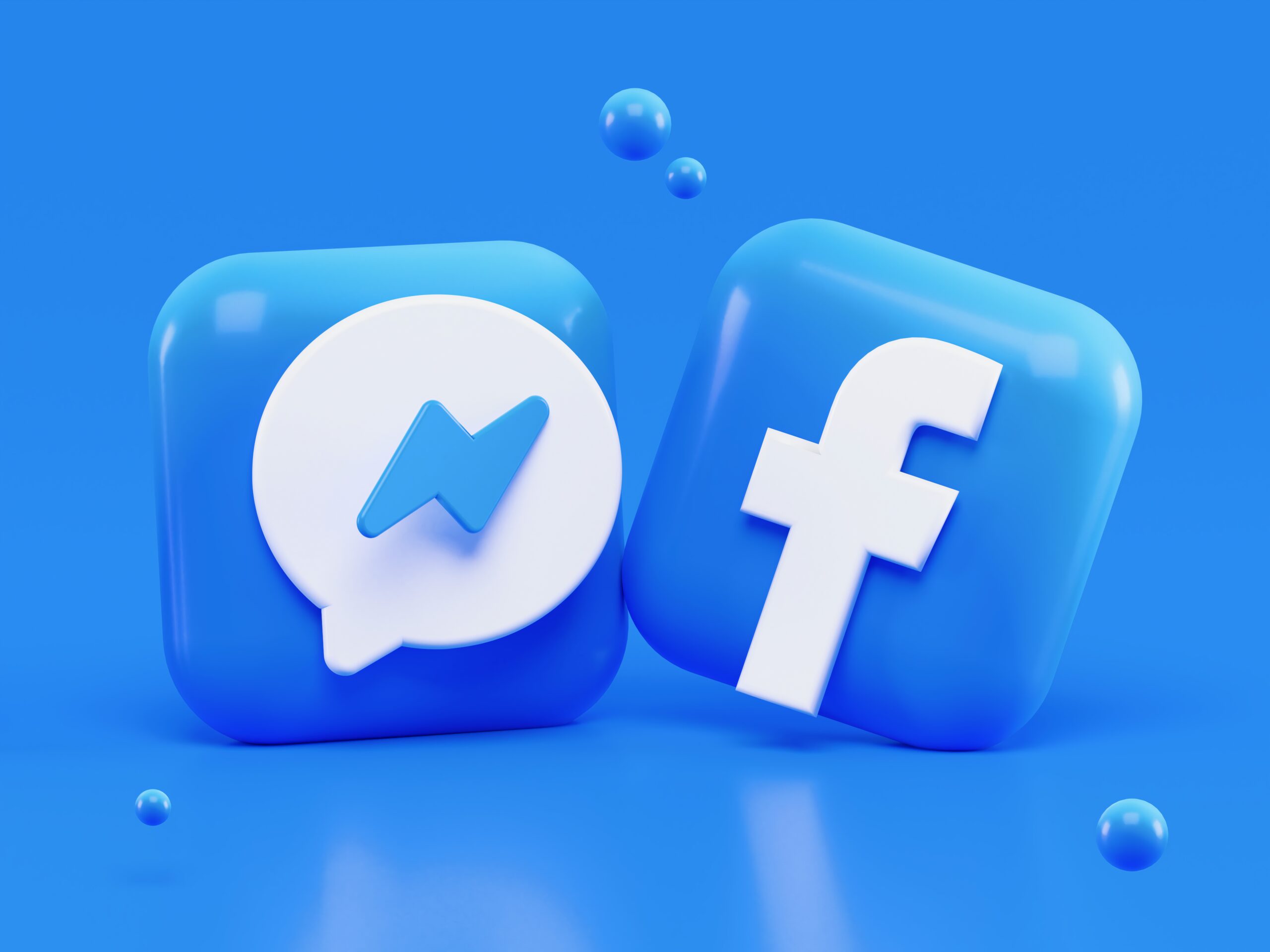 Facebook and facebook messanger logos with blue background