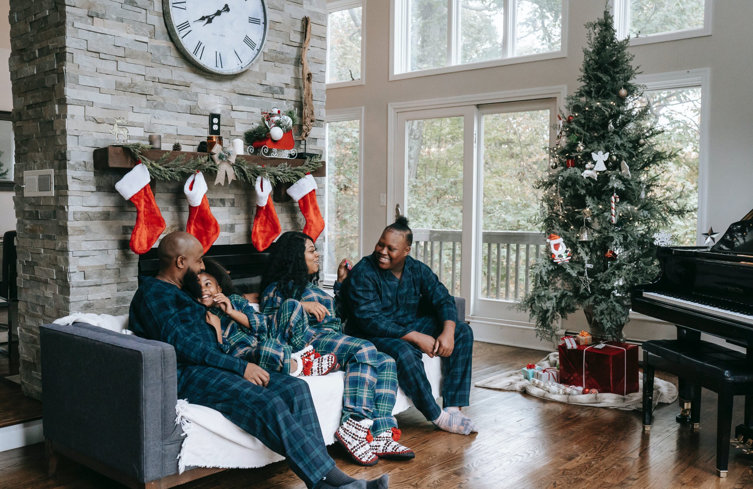 family gathered sitting and talking on a christmas eve